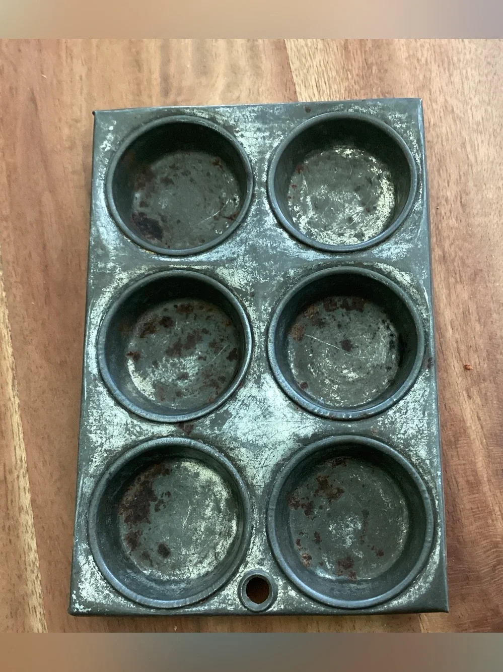 Vtg. Children’s toy muffin tin or miniature salesmen sample. Hole to hang
